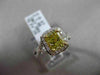 ESTATE 1.82CTW GIA FANCY YELLOW DIAMOND 18KT WHITE GOLD HALO ENGAGEMENT RING