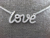 ESTATE 0.16CT DIAMOND 18KT WHITE GOLD 3D CLASSIC SCRIPT LOVE NECKLACE