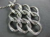 ESTATE LARGE 1.02CT DIAMOND 18KT WHITE GOLD MULTI LINK LOVE KNOT FLOWER PENDANT