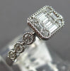 .41CT DIAMOND 14KT WHITE GOLD 3D ROUND & BAGUETTE INVISIBLE FILIGREE LOVE RING
