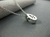 ESTATE .07CTW SOLITAIRE FLOATING 18KT WHITE GOLD ROUND TEAR DROP PENDANT #7561