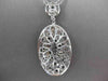 ESTATE LARGE 5.18CT BLACK & WHITE DIAMOND 18KT WHITE GOLD OVAL FLOATING NECKLACE