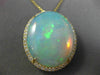 ESTATE EXTRA LARGE 14.04CT DIAMOND & AAA OPAL 14KT YELLOW GOLD OVAL HALO PENDANT