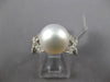 LARGE .21CT DIAMOND & AAA SOUTH SEA PEARL 18KT WHITE GOLD 3D INFINITY LOVE RING