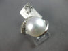 LARGE .48CT DIAMOND & AAA SOUTH SEA PEARL 18KT WHITE GOLD CRISS CROSS SWIRL RING