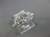 ESTATE WIDE .84CT DIAMOND 18KT WHITE GOLD CLUSTER LOVE KNOT FLOWER FUN RING