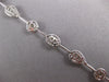 2.35CT DIAMOND 14KT WHITE GOLD 3D OVAL & ROUND BY THE YARD LOVE TENNIS BRACELET