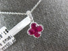 SMALL .78CT DIAMOND & AAA RUBY 18KT WHITE GOLD INVISIBLE 4 LEAF CLOVER PENDANT