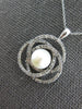 .50CT DIAMOND & AAA SOUTH SEA PEARL 14KT WHITE GOLD LOVE KNOT INFINITY PENDANT