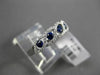 ESTATE .65CT DIAMOND & AAA SAPPHIRE 18KT WHITE GOLD INFINITY ETOILE RING