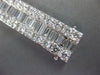 EXTRA LARGE 21.95CT DIAMOND 18KT WHITE GOLD 3D CLASSIC INFINITY TENNIS BRACELET