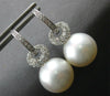 ESTATE LARGE .57CT DIAMOND & TAHITIAN PEARL 18KT WHITE GOLD LOVE KNOT HANGING EARRINGS