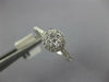 ESTATE .31CT DIAMOND 18KT WHITE GOLD 3D CLUSTER FLOWER HALO FRIENDSHIP RING