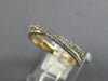 ESTATE .48CT DIAMOND 14KT YELLOW GOLD 3D CLASSIC CRISS CROSS INFINITY LOVE RING