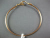 .26CT DIAMOND 14KT ROSE GOLD CLASSIC LOVE KNOT DOUBLE HEART LOVE BANGLE BRACELET