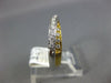 ESTATE .25CT DIAMOND 18KT 2 TONE GOLD CLASSIC 3D CLASSIC CRISS CROSS X LOVE RING