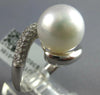 LARGE .48CT DIAMOND & AAA SOUTH SEA PEARL 18KT WHITE GOLD CRISS CROSS SWIRL RING