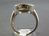 ESTATE LARGE .51CT DIAMOND 14KT WHITE GOLD 3D BEZEL SNOWFLAKE FLOWER OVAL RING