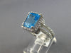 6.40CT DIAMOND & AAA BLUE TOPAZ 14KT WHITE GOLD 3D EMERALD CUT & ROUND HALO RING