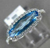 ESTATE 1.56CT DIAMOND & AAA OVAL BLUE TOPAZ 14KT WHITE GOLD HALO FILIGREE RING