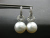 ESTATE LARGE .57CT DIAMOND & TAHITIAN PEARL 18KT WHITE GOLD LOVE KNOT HANGING EARRINGS