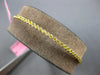 .91CT INTENSE FANCY YELLOW DIAMOND 18KT YELLOW GOLD 2MM FILIGREE BANGLE BRACELET
