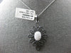 LARGE 1.33CT WHITE & BLACK DIAMOND 14KT WHITE GOLD OVAL FLOWER FLOATING PENDANT