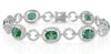 LARGE 10.36CT DIAMOND & AAA EMERALD 18KT WHITE GOLD 3D LOVE KNOT TENNIS BRACELET