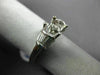 ESTATE .68CT ROUND & BAGUETTE CUT DIAMOND PLATINUM 3D SEMI MOUNT ENGAGEMENT RING