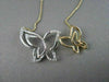 ANTIQUE 18KT WHITE & YELLOW DOUBLE BUTTERFLY DIAMOND NECKLACE
