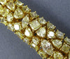 ESTATE EXTRA LARGE 25.71CT FANCY YELLOW DIAMOND 18KT YELLOW GOLD TENNIS BRACELET