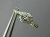 ESTATE .61CT DIAMOND 14KT YELLOW GOLD 3D TWO STONE LOVE CLASSIC HUGGIE EARRINGS