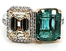 8.29CT WHITE & FANCY YELLOW DIAMOND & AAA EMERALD 18KT 2 TONE GOLD 2 STONE RING