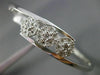ESTATE .10CT DIAMOND 14KT WHITE GOLD PAST PRESENT FUTURE FLOWER BANGLE BRACELET