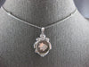 LARGE .23CT DIAMOND 18KT WHITE GOLD CIRCULAR DANCING PIG BY THE YARD FUN PENDANT