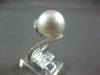 LARGE .32CT DIAMOND & AAA SOUTH SEA PEARL 18KT WHITE GOLD CRISS CROSS LOVE RING