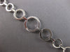 LARGE .55CT DIAMOND 14KT WHITE GOLD 3D CIRCLE OF LIFE GRADUATING TENNIS BRACELET