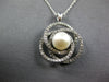 .50CT DIAMOND & AAA SOUTH SEA PEARL 14KT WHITE GOLD LOVE KNOT INFINITY PENDANT