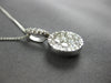 LARGE 1.05CT DIAMOND 18KT WHITE GOLD 3D INVISIBLE CIRCULAR FUN FLOATING PENDANT