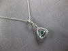 .50CT DIAMOND & AAA EMERALD 18KT WHITE GOLD 3D TRILLION & ROUND FLOATING PENDANT