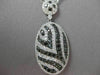 ESTATE LARGE 5.18CT BLACK & WHITE DIAMOND 18KT WHITE GOLD OVAL FLOATING NECKLACE