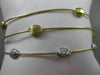 ESTATE .42CT DIAMOND 14KT TWO TONE GOLD HAMMERED BY THE YARD BANGLE BRACELET