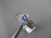 ESTATE 1.08CT DIAMOND & AAA TANZANITE 14KT WHITE GOLD CLUSTER ENGAGEMENT RING