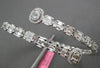 LARGE 5.69CT DIAMOND 18KT WHITE GOLD ROUND & BAGUETTE INVISIBLE BANGLE BRACELET