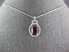 1.59CT DIAMOND & AAA RUBY 14KT WHITE GOLD OVAL & ROUND LOVE KNOT PENDANT #27261