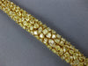 ESTATE EXTRA LARGE 25.71CT FANCY YELLOW DIAMOND 18KT YELLOW GOLD TENNIS BRACELET