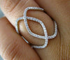ESTATE WIDE .36CT DIAMOND 18KT WHITE GOLD OPEN DOUBLE INFINITY HOOP X LOVE RING