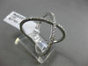 ESTATE LARGE .61CT DIAMOND 14KT WHITE GOLD 3D CRISS CROSS X INFINITY LOVE RING