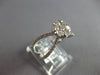 ESTATE LARGE .64CT DIAMOND 14KT WHITE GOLD FLOWER CRISS CROSS INFINITY LOVE RING