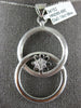 ESTATE LARGE .19CT DIAMOND 18KT WHITE GOLD FLOWER LOVE KNOT CIRCULAR FUN PENDANT